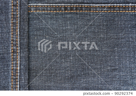 Detailed abstract texture of dark blue denim cloth. Background image of old used denim trousers fabric Detailed abstract texture of dark blue denim cloth. Background image of old used denim trousers fabric 90292374