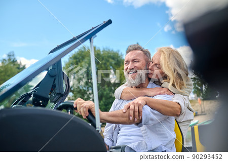 A mature couple having a weekend on a river and looking happy 90293452