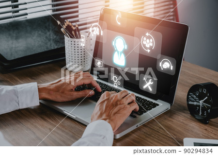 Technical support customer service concept, Person hand using laptop computer with VR screen support customer icon, Technology internet concept, it support, call center and customer service help.... 90294834