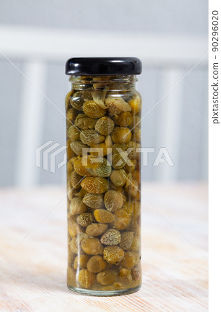 Pickled capers in glass jar Pickled capers in glass jar 90296020