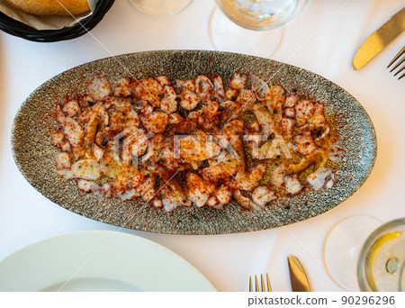 Seafood carpaccio from octopus tentacles with smoked paprika Seafood carpaccio from octopus tentacles with smoked paprika 90296296