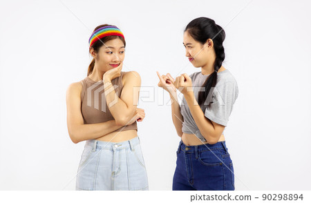 Studio portrait of Young asian women in concept of lgbt couple isolated on white wall background. 90298894