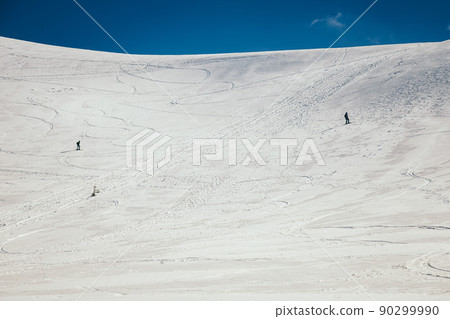 Snow in the mountains, skiers spring and winter Snow in the mountains, skiers spring and winter 90299990