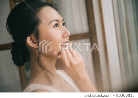 Women who brush their teeth and women who use bamboo toothbrushes Women who brush their teeth and women who use bamboo toothbrushes 90300033