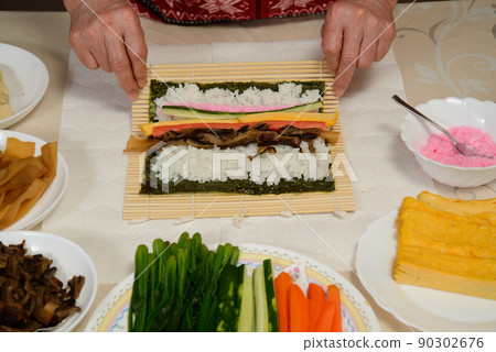 Ehomaki Makizushi: Maki sushi to be eaten at Setsubun, your wish will come true if you bite into Ehomaki. Ehomaki Makizushi: Maki sushi to be eaten at Setsubun, your wish will come true if you bite into Ehomaki. 90302676