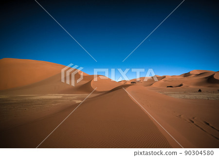 Landscape of sand dune and sandstone nature sculpture at Tamezguida in Tassili nAjjer national park, Algeria 90304580