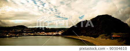 Sunset view to Horta, Porto Pim Bay and beach from mount Guia, Faial island, Azores, Portugal Sunset view to Horta, Porto Pim Bay and beach from mount Guia, Faial island, Azores, Portugal 90304610