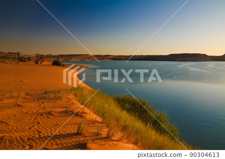 Sunset Panoramic view to Yoa lake group of Ounianga kebir lakes at the Ennedi, Chad 90304613