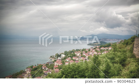 Panoramic aerial view to Ohrid lake and city from Konjsko, Elshani, North Macedonia Panoramic aerial view to Ohrid lake and city from Konjsko, Elshani, North Macedonia 90304625