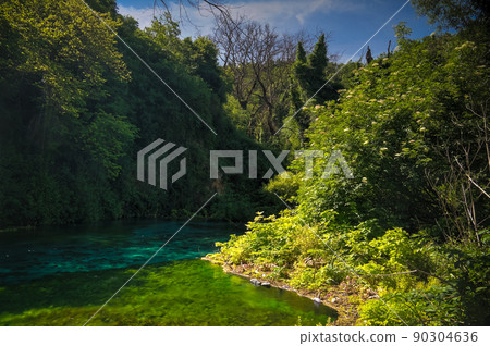 View to Blue Eye spring, initial water source of Bistrice river,near Muzine in Vlore County, southern Albania. View to Blue Eye spring, initial water source of Bistrice river,near Muzine in Vlore County, southern Albania. 90304636