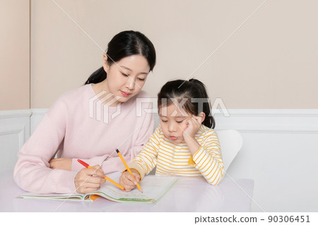 Asian Korean daughter studying with mom Asian Korean daughter studying with mom 90306451