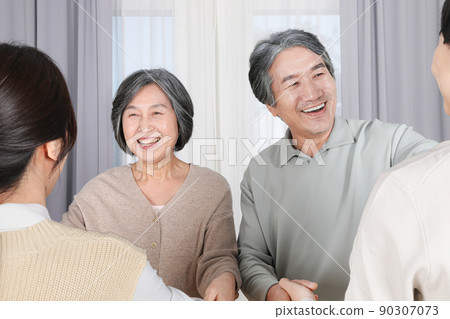 Asian Korean family_Grandparents welcoming their grandchildren Asian Korean family_Grandparents welcoming their grandchildren 90307073