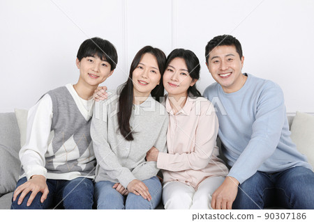Asian Korean family_Photo of a smiling family sitting side by side Asian Korean family_Photo of a smiling family sitting side by side 90307186
