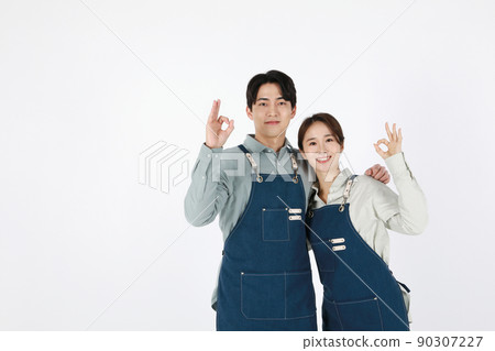 start up concept asian korean young woman and man with hand motions start up concept asian korean young woman and man with hand motions 90307227