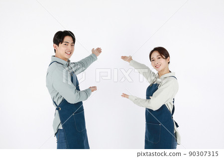 start up concept asian korean young woman and man with hand motions start up concept asian korean young woman and man with hand motions 90307315