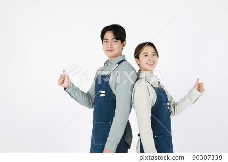 start up concept asian korean young woman and man with hand motions start up concept asian korean young woman and man with hand motions 90307339