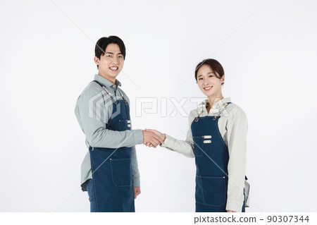 start up concept asian korean young woman and man with hand motions start up concept asian korean young woman and man with hand motions 90307344