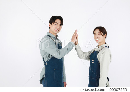 start up concept asian korean young woman and man with hand motions start up concept asian korean young woman and man with hand motions 90307353