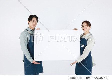 start up concept asian korean young woman and man holding a panel start up concept asian korean young woman and man holding a panel 90307410