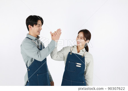 start up concept asian korean young woman and man with hand motions start up concept asian korean young woman and man with hand motions 90307622