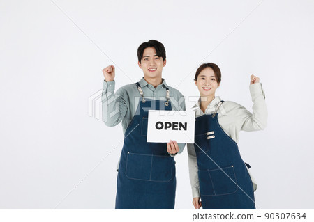 start up concept asian korean young woman and man holding a panel start up concept asian korean young woman and man holding a panel 90307634