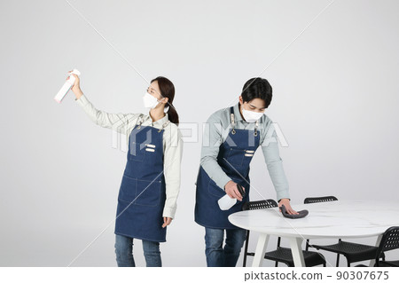 Asian Korean young man and woman startup concept_disinfecting Asian Korean young man and woman startup concept_disinfecting 90307675