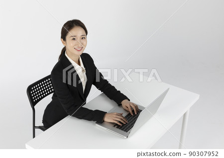 Asian Korean young man and woman startup concept wearing smart business suit_a young man taking a online interview with a laptop Asian Korean young man and woman startup concept wearing smart business suit_a young man taking a online interview with a laptop 90307952