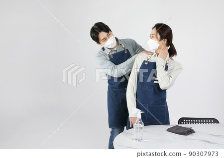 Asian Korean young man and woman startup concept_Young men giving a massage Asian Korean young man and woman startup concept_Young men giving a massage 90307973