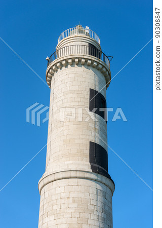 Ancient Lighthouse in white stone of the Murano Island - Venice Veneto Italy 90308847