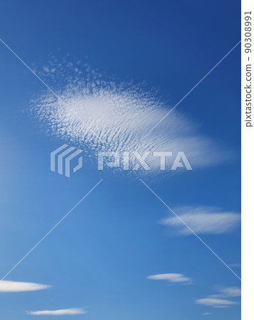 Abstract cirrus clouds on the blue sky background. Beautiful cloudscape scene Abstract cirrus clouds on the blue sky background. Beautiful cloudscape scene 90308991