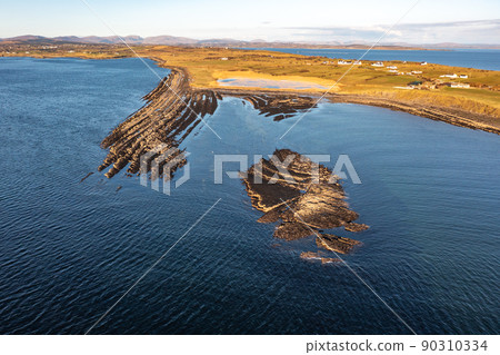 Aerial view of the amazing rocky coast at Rahan Far by Dunkineely, St Johns Point in County Donegal - Ireland. 90310334