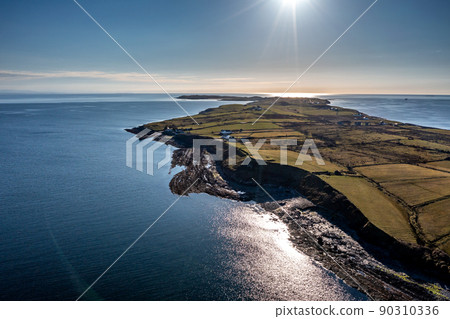 Aerial view of the amazing rocky coast at Ballyederland by St Johns Point in County Donegal - Ireland. 90310336