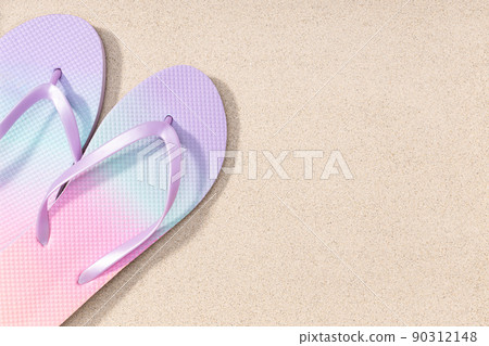 Summer background with fashion flip flops on beach sand background. Copy space. Top view Summer background with fashion flip flops on beach sand background. Copy space. Top view 90312148