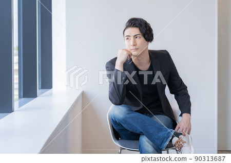 Portrait of a young man sitting on a chair Shooting cooperation "LINK FOREST" Portrait of a young man sitting on a chair Shooting cooperation "LINK FOREST" 90313687