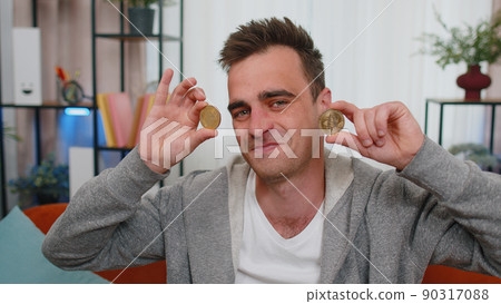 Guy stock trader earning bitcoins after online monitoring trading operations mining hold BTC coins 90317088