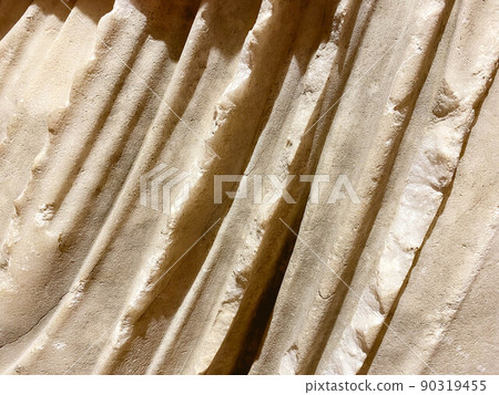 ancient texture. a stone of beige color, a piece of a statue. volumetric texture of stone and sand. a piece of fabric made of stone. fabric waves made by an artisan ancient texture. a stone of beige color, a piece of a statue. volumetric texture of stone and sand. a piece of fabric made of stone. fabric waves made by an artisan 90319455