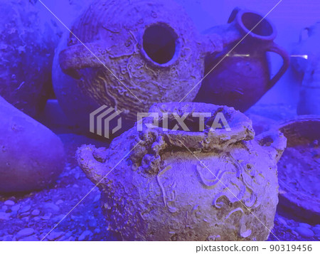 two decorative jugs underwater, sea world. decorative ware of the ancient world sank after a shipwreck. finds while diving two decorative jugs underwater, sea world. decorative ware of the ancient world sank after a shipwreck. finds while diving 90319456