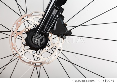 Bicycle Brake Rotor with Hydraulic Highway Braking System close-up Bicycle Brake Rotor with Hydraulic Highway Braking System close-up 90319975