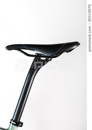 Bicycle saddle on a light background accessories for bike repair and tuning Bicycle saddle on a light background accessories for bike repair and tuning 90319976