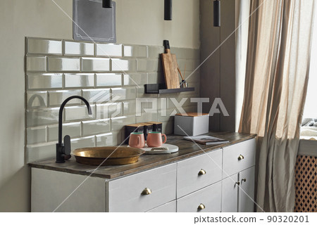 Elegant small kitchen with sink and counter at country house. 90320201