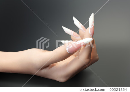 Young beautiful woman hands with elegant manicure Young beautiful woman hands with elegant manicure 90321864