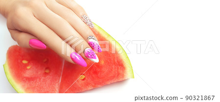 Hand with fashion manicure holding watermelon on white background. Hand with fashion manicure holding watermelon on white background. 90321867