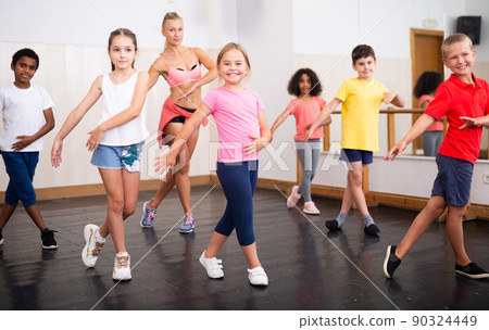 Boys and girls training in dance studio 90324449