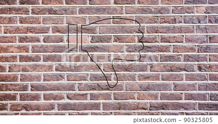 Image of glowing neon thumb down icon on brick wall 90325805