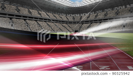 Image of gold confetti falling over glowing light trails in sports stadium 90325942