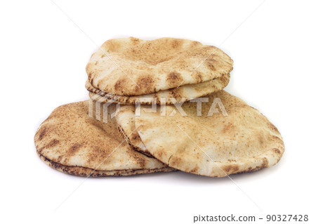 Pita bread isolated on white background. Traditional food of Arabic cuisine and culture Pita bread isolated on white background. Traditional food of Arabic cuisine and culture 90327428
