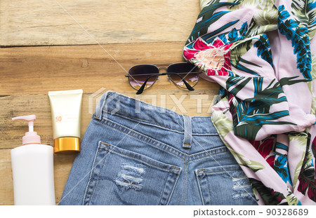 sunscreen spf50 cosmetics health care for skin face with sunglasses, flowers and cloth  90328689