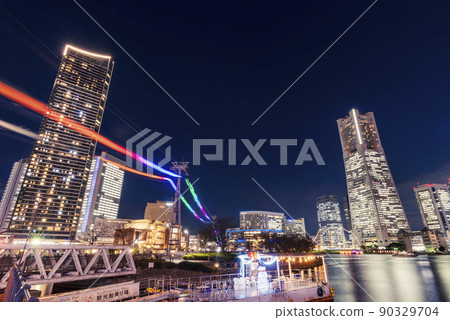 Night view of Yokohama Minatomirai / Iridescent illumination of the ropeway shining in the night sky Night view of Yokohama Minatomirai / Iridescent illumination of the ropeway shining in the night sky 90329704