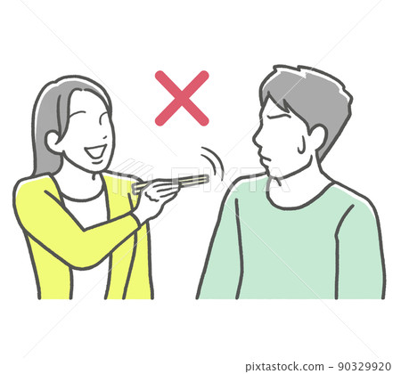 Violation of chopstick etiquette: A woman who points to chopsticks 90329920