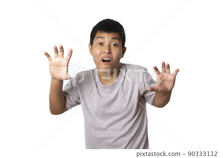 young man showing claws imitating a cat isolated on white background. 90333112